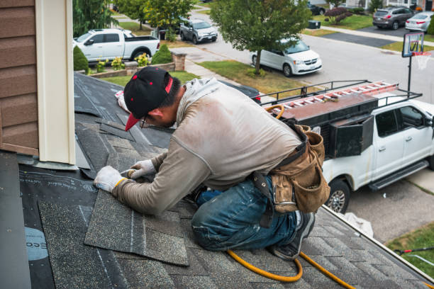 Professional Roofing technician working in Freeland, PA